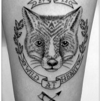 Memorial style black ink fox portrait with date and lettering tattoo on leg
