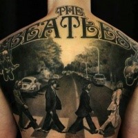 Memorial The Beatles themed back tattoo of music band walking across the road