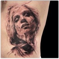 Mexican native detailed side tattoo of woman portrait
