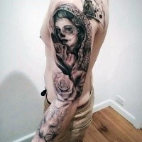Mexican native style black in sleeve tattoo of woman portrait with pistol, rose and wolf