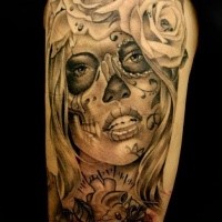 Mexican style black and white shoulder tattoo of woman portrait with roses
