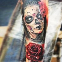 Mexican style colored arm tattoo of Woman with rose