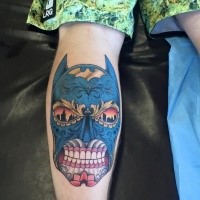 Mexican style colored leg tattoo of Batman face