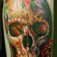Mexican style colored tattoo of human skull with ornaments