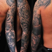 Mexican style detailed black and white tattoo with masks and compass on arm