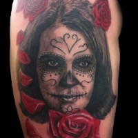 Mexican style painted detailed woman portrait tattoo on shoulder with roses