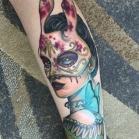 Mexican style wonderful colored mystical masked woman tattoo on leg stylized with butterfly