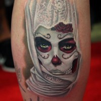 Mexican tradition detailed colored leg tattoo of woman portrait in hood