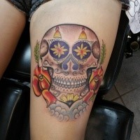 Mexican traditional colored thigh tattoo of skull with roses