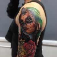 Mexican traditional style colored shoulder tattoo of woman with rose