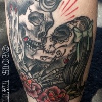 Mexican traditional style colored tattoo of kissing skeleton couple with flowers