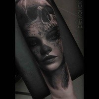 Mexican traditional style detailed forearm tattoo of woman portrait with skull by Eliot Kohek