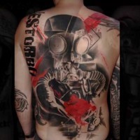 Military style colored big man in gas mask with lettering tattoo on whole back
