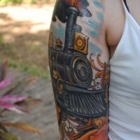 Modern art style colored upper arm tattoo of steam train with flowers