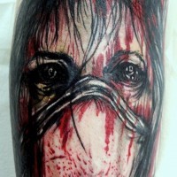 Modern horror movie bloody monster nurse tattoo on leg