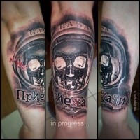 Modern style colored arm tattoo of astronaut with skeleton and lettering
