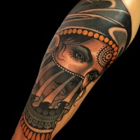Modern style colored arm tattoo of woman portrait