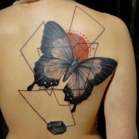 Modern style colored back tattoo of large butterfly with geometrical ornaments
