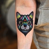 Modern style colored by David Cote forearm tattoo of smiling Cat