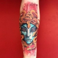 Modern style colored by Dino Nemec forearm tattoo of Medusa
