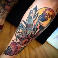 Modern style colored forearm tattoo of ocean crab with moon