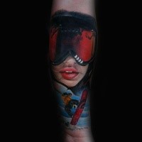 Modern style colored forearm tattoo of snowboarder woman