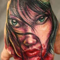 Modern style colored hand tattoo of bloody vampire woman