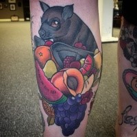 Modern style colored leg tattoo of cute bat with fruits