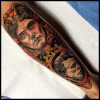 Modern style colored leg tattoo of woman portrait with old mans portrait