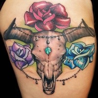 Modern style colored tattoo of animal skull with flowers and jewelry