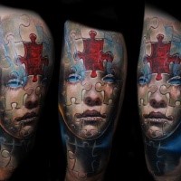 Modern style colored thigh tattoo of fantasy woman face with puzzle pice