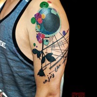 Modern style multicolored flower shaped shoulder tattoo combined with lettering