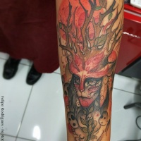 Modern traditional style colored arm tattoo of creepy woman with deers horns