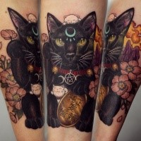 Modern traditional style colored forearm tattoo of maneki neko japanese lucky cat with golden tablet
