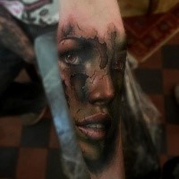 Modern traditional style colored forearm tattoo of corrupted woman face