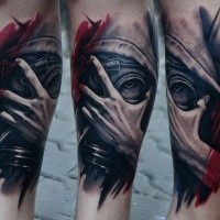 Modern traditional style colored leg tattoo of human in gas mask