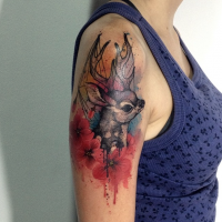 Modern traditional style colored shoulder tattoo of small deer with flowers
