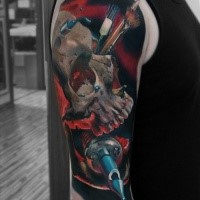 Modern traditional style colored shoulder tattoo of painters skull with brushes