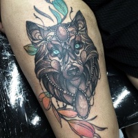 Modern traditional style colored thigh tattoo of wolf with jewelry and flowers