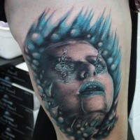 Modern traditional style colored thigh tattoo of drowned woman face