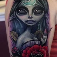 Monster cartoon like colored mystical witch tattoo on shoulder stylized with moon and flowers