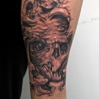 Monster skull tattoo on leg