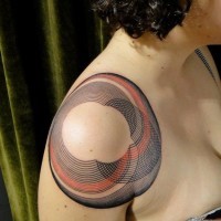 Multicolored big hypnotic circles tattoo on shoulder