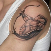 Muscular warrior with bow tattoo on shoulder