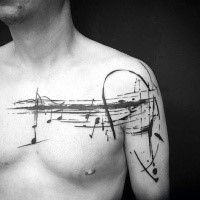 Music themed black ink collarbone tattoo of notes