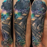 Music themed great painted and colored massive sleeve tattoo
