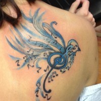 Musical bird tattoo