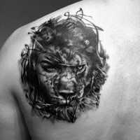 Mysterious black and white shoulder tattoo of half lion half woman face