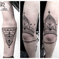 Mysterious black ink arm tattoo of mystical ornament