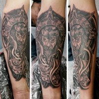 Mysterious black ink forearm tattoo of lion with ancient sculpture and flower
